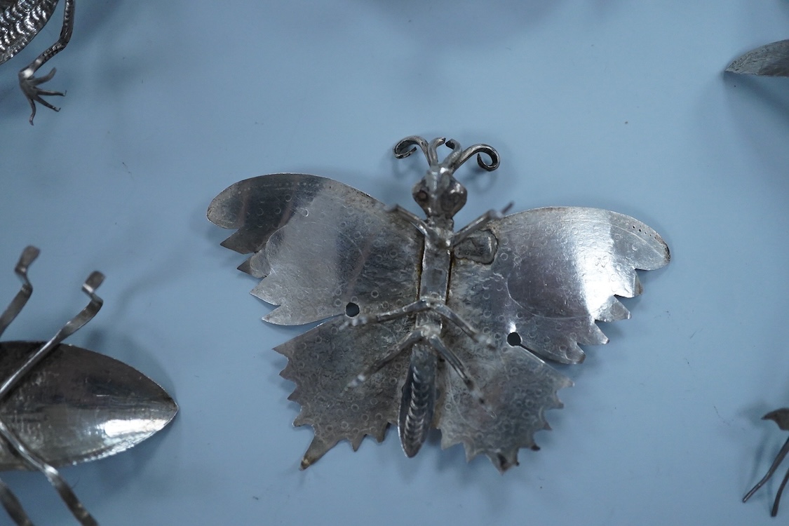 Six Thai or Malaysian white metal models of creatures, to include a Praying Mantis, height 45mm, a tortoise, a dragonfly, a butterfly, a lizard and a beetle.